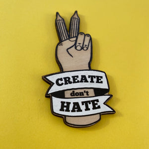 Create don't Hate brooch