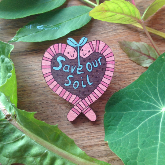 SOS - Save Our Soil pin badge