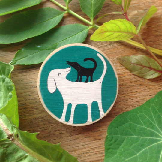 Doggyback wooden pin badge